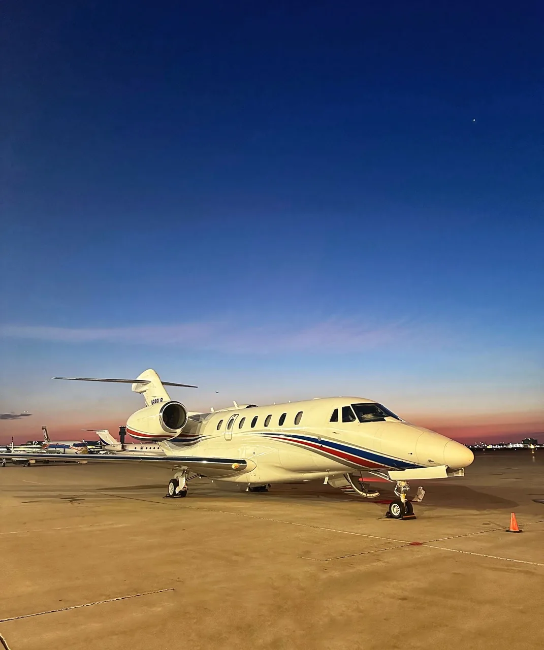 Private jet on the ramp at golden hour, Jet Corp supplemental charter