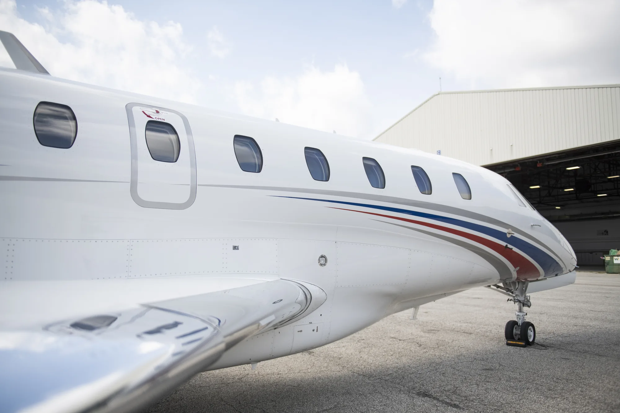 Wing and fuselage of a Cessna Citation X on the ramp
