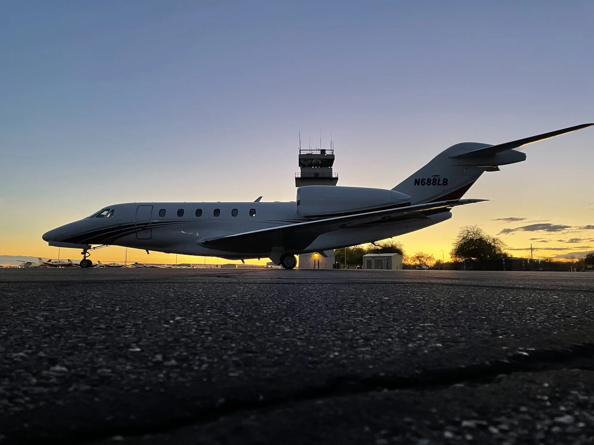 Cessna Citation X on the ramp at sunset, ready for departure with Jet Corp